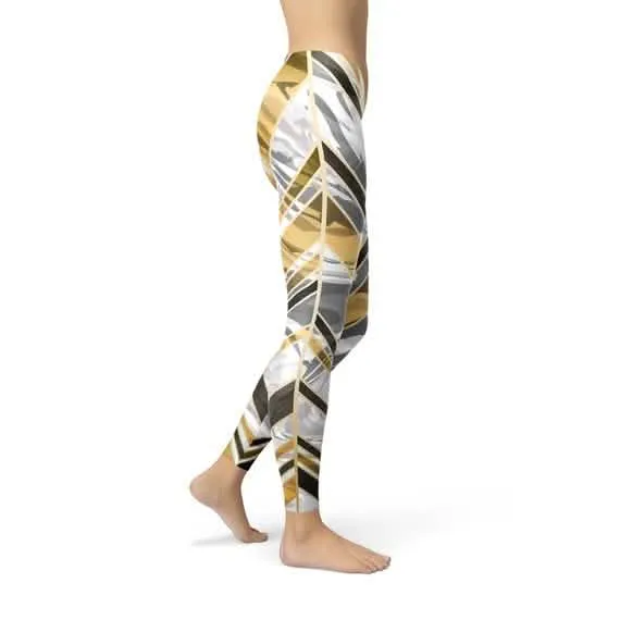 Elegant Women's Marble Print Leggings with Black and Gold Accents